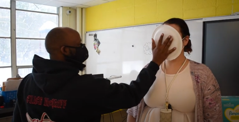 Syracuse Academy of Science and Citizenship elementary school encourages students to donate diapers to the Diaper Drive event for a chance to pie their teacher in the face.