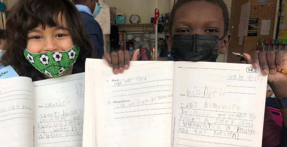 Syracuse Academy of Science and Citizenship elementary school students in 2A  practice their persuasive writing skills by writing compelling letters to various people while keeping certain goals in mind.
