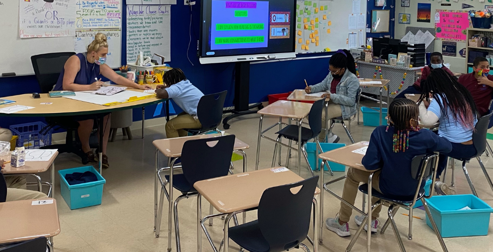 Syracuse Academy of Science and Citizenship 5th grade students in Ms. Edgar and Ms. Byington class practice analyzing text using a graphic organizer.