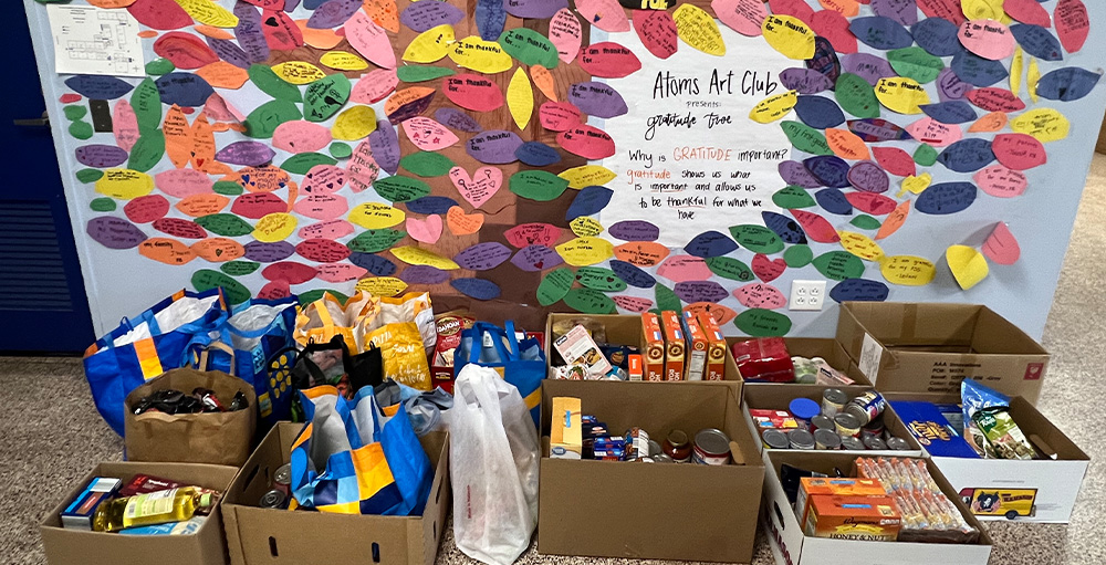 Families and Students at Citizenship & Science Academy of Syracuse Participate in Food Bank of Central New York Donation Drive